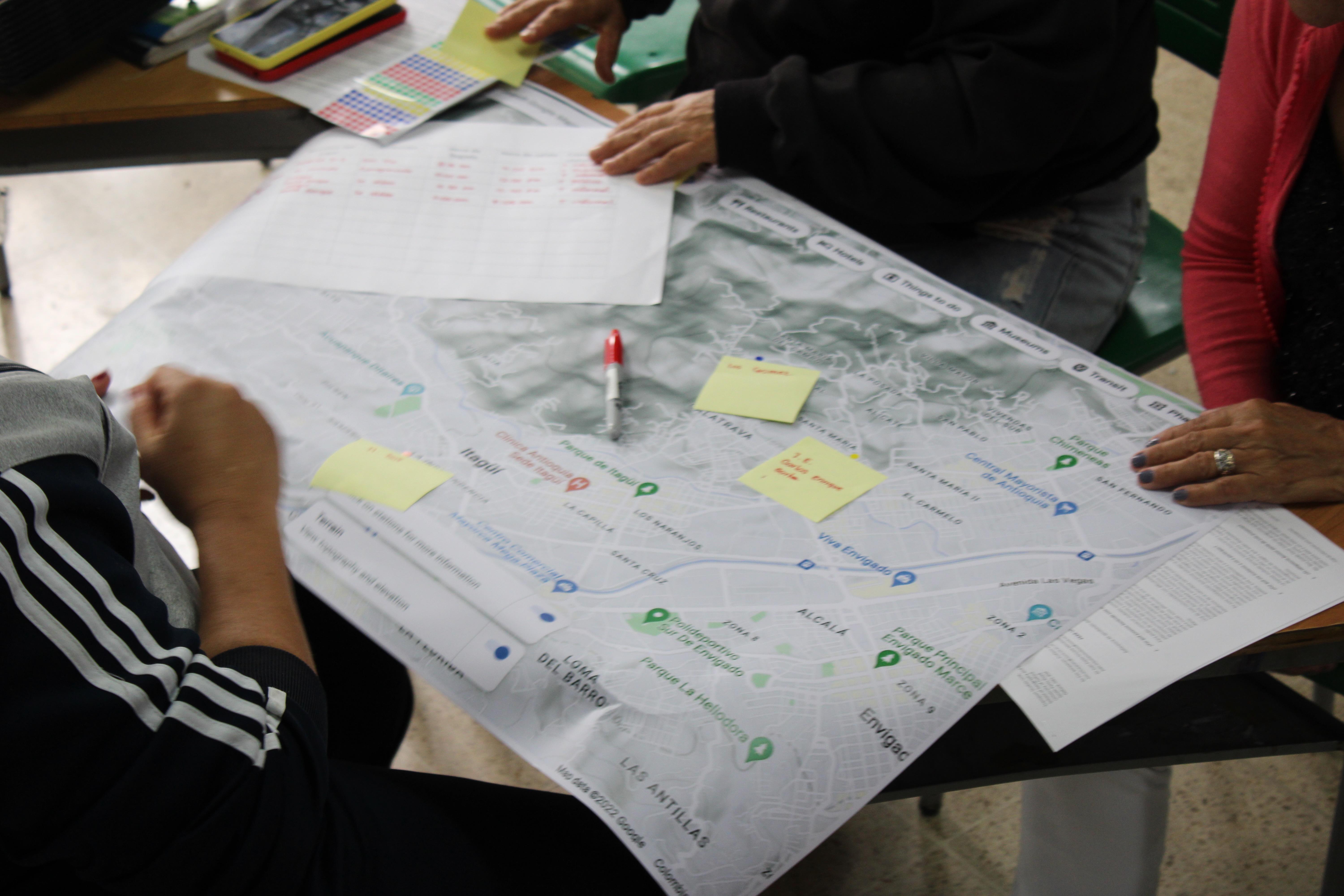 People gathered around a map